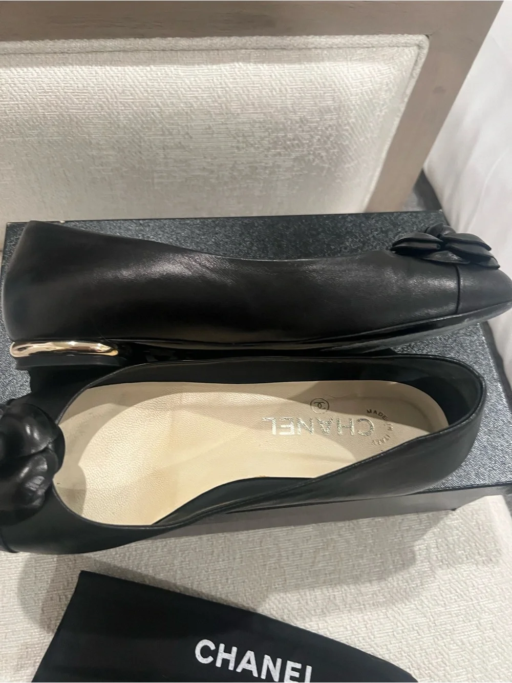 CHANEL Black Leather Camellia Round-Toe Flats